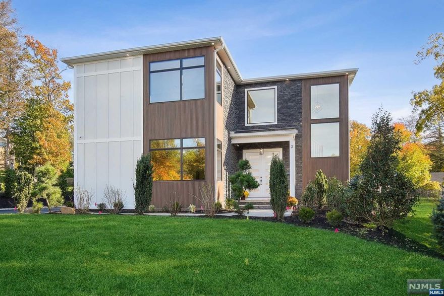 Impeccable attention to detail with Elegant Herringbone HW Floors, Clean Lines, Coffered Ceilings, Wainscotting & Sophisticated Moldings throughout. First floor boasts 10ft High Ceilings, Open Concept Living, Sound System, Dining Rm, Family Rm w/Gas FP & a 1st Floor Guest Suite w/ large bedrm, WIC &attached full bath. Gourmet Kitchen with Massive Center Island is the Heart of this Home. High End SS Appliances, Detailed Cabinetry, Quartz Counters, Walk-in Pantry & Oversized Sliders Leading to Patio. Powder Rm & Mud Rm complete 1st flr. Grand Primary Suite w/ tray ceilings, FP & Custom Walk-in Closet. Primary Spa Bath Retreat w/ Heated Floors, Water Closet, Soaking Tub & Jetted Shower. Three Additional Expansive Guest Bedrms, each with their En Suite & WIC. Laundry & Hall Linen Closet. Full finished walkout basement w/bedrm, bath, wet bar, rec rm. Landscaping includes sod, trees, bushes and irrigation. Plenty of room for future pool. Builders 10 Year Warranty.