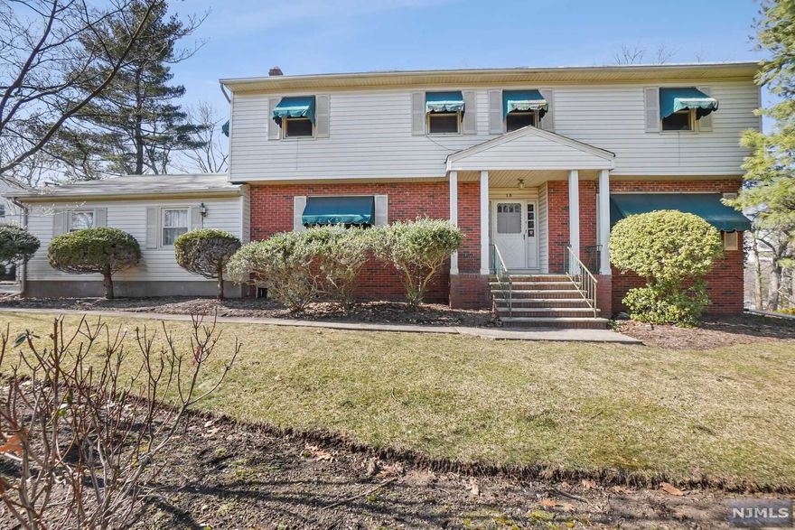 Opportunity knocks...This sun-filled Colonial has great curb appeal & is nestled on a beautiful property on a most desirable street & neighborhood. Bring your vision,customize & make this 4 bedrm CHC your new home this year.This home boasts large elegant rooms & a fabulous floor plan. The 1st floor features an entry foyer with 2 guest closets, a front to back living room with picture window, a family room, an EIK with a walk-in pantry, a large dining room, a powder room & laundry room. On the 2nd flr there is a large primary bedrm suite with a MBA & 2 closets (1 walk in) in the dressing area plus are 3 additional, nice size bedrooms & a full bath. Other features of this home include:the large partially finished basement, a 2 car garage with attic access, hardwood floors under the carpets, 2 zone central air, 2 zone hot water baseboard heat & a beautifully landscaped backyard with 2 patios.Great location & convenient to schools,shopping,restuarants & NYC transportation.