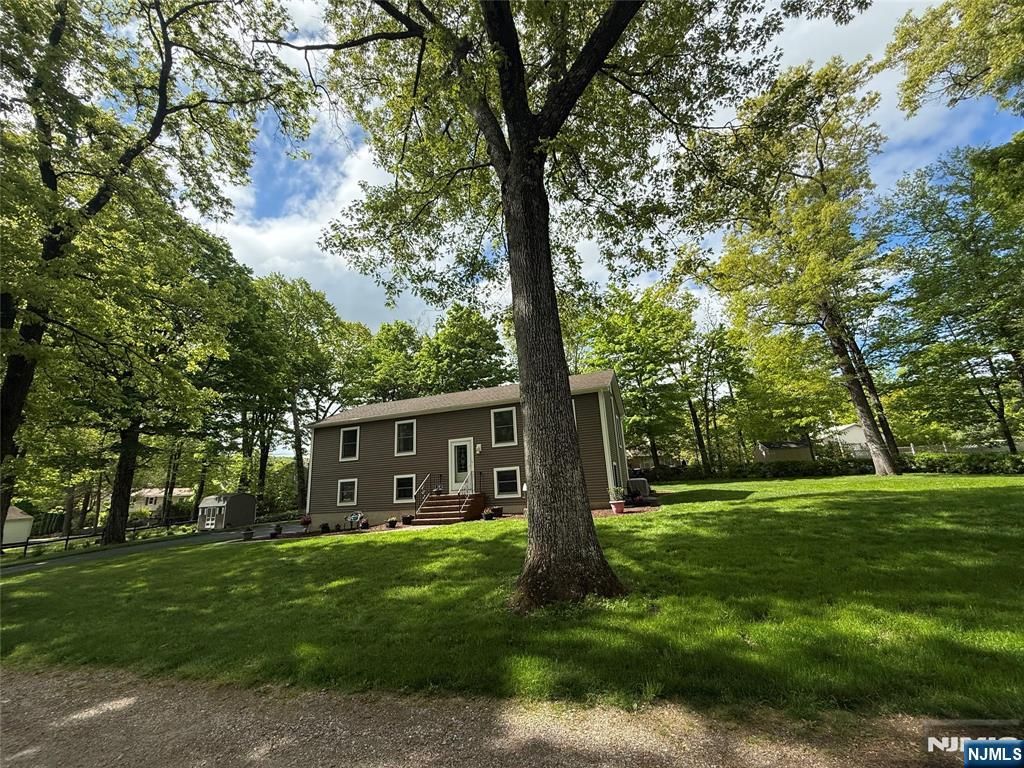 Photo of 10 Monique Lane, West Milford, NJ 07480 (MLS # 26017883)