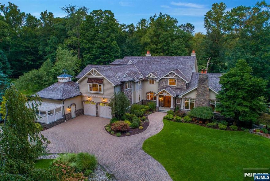 NEWLY RENOVATED DREAM HOME, EACH ROOM MORE FABULOUS THAN THE NEXT! PRIV 3.4 ACRE ESTATE OFFERING OVER 8100 SQ FT! DREAM KITCHEN IS LIGHT & BRIGHT W/BEAMED CEILING, OVERSIZED SEATED ISLAND, HIGH END APPLIANCES, SITTING RM, BREAKFAST AREA & 2 BUTLER PANTRIES. KITCH OPENS TO FAB FAM RM W/STONE FP, BLT INS, COFFRD CEILING & VIEWS. CONSERVATORY W/WALLS OF WINDOWS & ENTRY TO LARGE BLNCY OVERLOOKING PRIVATE PROPERTY. GREAT RM W/CATHEDRAL CEILING & STONE FP. DR, 2 PRs, MUD RM, LAUNDRY, PET RM & ENTRY TO 4 CR GARAGE COMPL THE 1ST FL. GRAND PRIMARY SUITE W/FP, BLT INS, OFFICE AREA, WIC, LUX SPA LIKE BTH. LARGE HOME OFFICE W/FP, BONUS RM/ART STUDIO W/BMD CEILING, WET BAR & BUILT INS. 2 ADDT'L ENSUITE BEDROOMS. LOWER LVL W/ WALK OUT TO COVERED PRCH, MEDIA AREA W/WET BAR, FULL BTH, 2 ADTL BRS, PR & GYM. RADIANT HEAT, MATURE GROUNDS, KOI POND, HEATED DRIVEWAY, SECURITY, GENERATOR. INCREDIBLE VALUE, NOTHING TO DO BUT MOVE RIGHT IN THIS TRULY IS YOUR DREAM HOME AND PROPERTY!