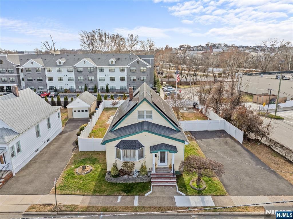 Photo of 702 Lake St, Fair Lawn, NJ 07410 (MLS # 25044092)