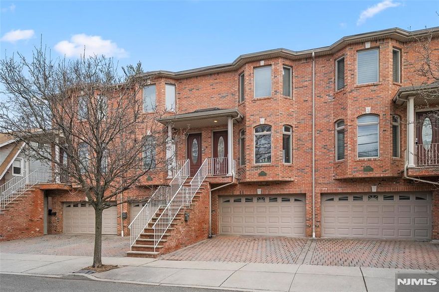 Welcome to this beautifully maintained attached townhouse located in a convenient area of Palisades Park. Situated in a charming 6-unit townhouse complex, this home offers comfortable living in a prime location. The home features a spacious kitchen with granite countertops, a center island, and solid cherry wood cabinetry. Stainless steel appliances and hardwood floors throughout add warmth and elegance to the living space. The primary bathroom includes a relaxing jacuzzi tub and a separate frameless glass shower. Additional highlights include skylights and recessed lighting that fill the home with natural light. Conveniently located within walking distance to NYC transportation, supermarkets, and houses of worship, making commuting and everyday living incredibly convenient. Donâ€™t miss this wonderful opportunity to own a beautiful home in a highly desirable location.