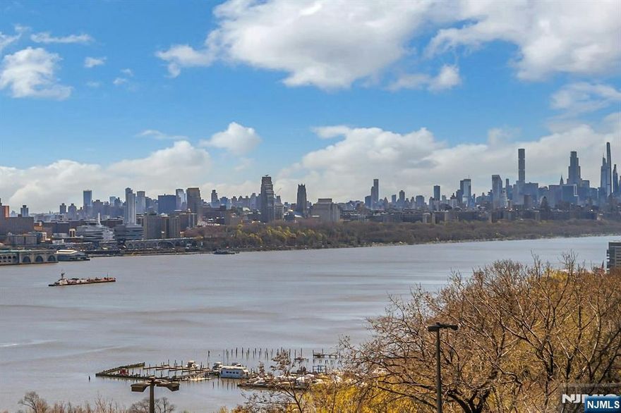 DELUXE CORNER UNIT WITH HUDSON RIVER VIEWS FROM EVERY ROOM! This sun-filled apartment features approx. 1570 sq. ft of living space. Gracious entry leads right to an open kitchen with a center island that adds both counter space and storage cabinets. Terrace enclosure creates a bonus room that may be a den or home office with floor to ceiling walls of glass. Kitchen floor is tiled; wood flooring throughout the rest of the apartment. Primary bedroom suite offers plenty of closets with extra storage, and a bathroom with a walk-in shower. Second bedroom is also generous sized; second bath features a tub/shower. Century Tower is a premier, luxury building with amenities that include 24 hr doorman and concierge, heated outdoor pool, fitness center, community room, kids playroom, BBQ grills and much more. Near good schools, Houses of Worship, shopping, restaurants and easy transportation to NYC. Parking $90. Subject to Board approval.