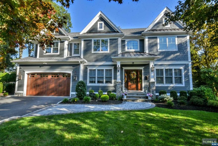 The Dream House you have been waiting for is here. Luxury at its finest with every high end finish and premium building material throughout.This 5 year young home is perfection with an amazing layout. The gas lanterns outside, coffered ceilings, and accent walls set the stage for this beauty including the banquet sized dining room, luxurious Living Room, inviting family room that opens to the Gourmet Kitchen and lavish PR. The High-end Kitchen includes a huge island, wet bar/coffee bar, entertainer's bar, Pantry and custom hood. On the 2nd Fl is the deluxe Primary suite w/gas FPL, stunning bathroom w/lilypad tub and shower and custom closets, JJ Bath with 2 adjoining BRs, Hall Bath and 2 BRs and Laundry. Enjoy all the basement has to offer - recreational area, gym and infrared sauna. Outside is great living space w/outdoor kitchen, fire pit, dining and lounge area. FullHouse Generator too! Don't miss this one...move right in!