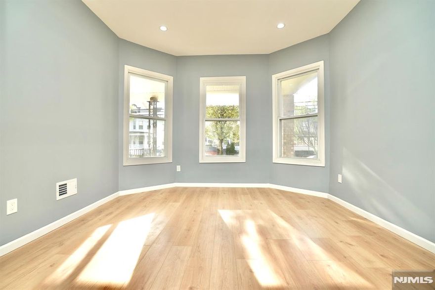 Completely renovated duplex in the desirable Forest Hill section of Newark offering exceptional space and modern upgrades throughout. This impressive property features a bright living room, formal dining room, a brand-new kitchen, and a versatile den. With 8 spacious bedrooms and 3 beautifully updated bathrooms, there is plenty of room for comfortable living. The finished basement adds even more functionality, including a family room and private office?perfect for work or relaxation. Step outside to a generous backyard ideal for entertaining, gatherings, and barbecues. Conveniently located within walking distance to Branch Brook Park, famous for its stunning cherry blossoms, and close to NYC transportation, schools, and local amenities.