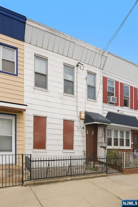 Photo of 119 Paterson Street, Jersey City, NJ 07307 (MLS # 25030725)