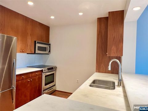 Photo of 3112 City Pl #3112, Edgewater, NJ 07020 (MLS # 25031283)