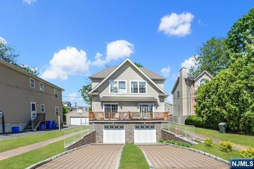 Newer Duplex in Tenafly. Built in 2012. You have a great opportunity to live in the highly sought after town of Tenafly! Left side of duplex is for lease. This south facing home has 4 bedrooms and 3.5 bathrooms. Hardwood floors throughout, stainless steel appliances with stone countertops in the kitchen, grand island, central vacuum, alarm system, and private flat backyard. One car attached garage, generator, and lots of closet space. Full finished lower level has bedroom, full bathroom, laundry, and door to attached one car garage. No pets. Convenient location to top Tenafly public schools, NYC transportation, parks, and lovely downtown Tenafly.