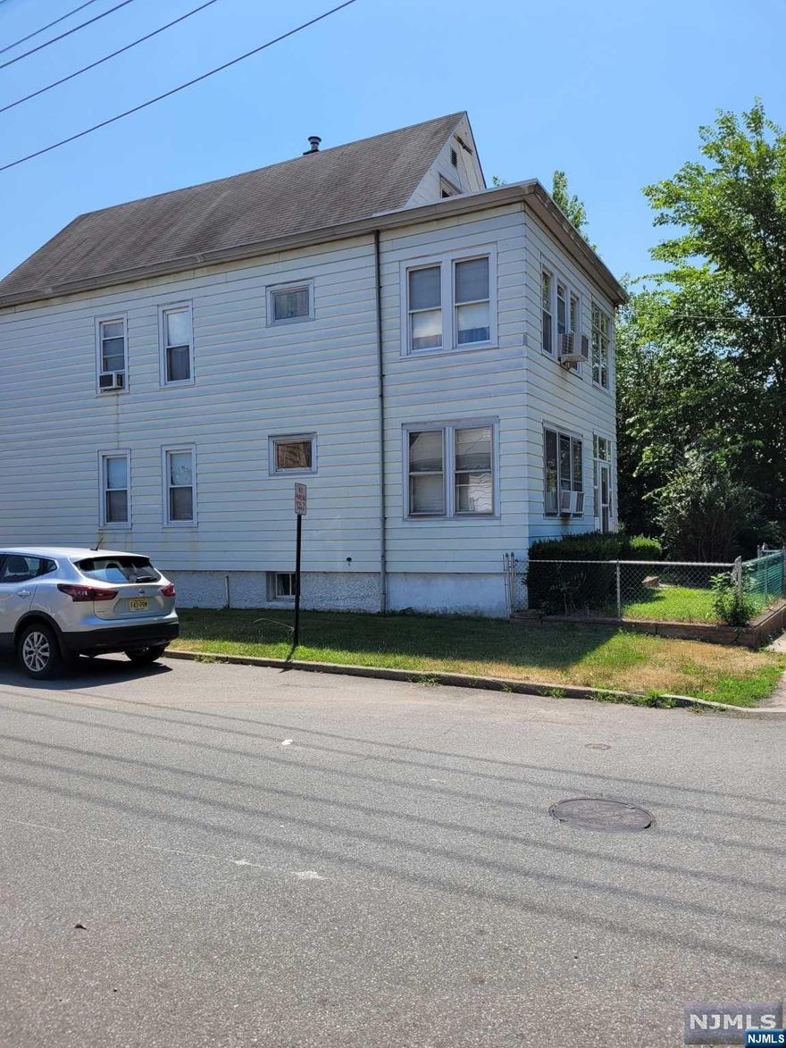 2-Family located on large piece of property, almost 1/2 acre. House and Garages in need of major repairs and are being sold "AS IS". Active Insured underground Oil Tank on property. 70ft. well in driveway-not active. Preference to cash offers or rehab loan. PROPERTY SOLD AS IS - BUYER RESPONSIBLE FOR ALL CERTIFICATES & INSPECTIONS.