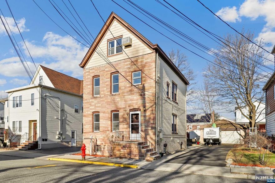 2 family brick house with a large backyard and patio. Each unit has separate utilities. Detached 2 car garage with a loft for storage. The Driveway can park multiple cars. Located on a cul de sac. Seller is selling As Is.