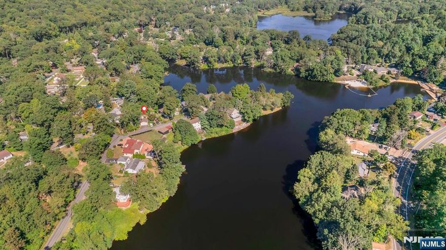 Discover the charm of this 2-bedroom, 1.5-bath cottage tucked away on a peaceful dead-end street along the shores of 51-acre Lake Swannanoa. With breathtaking lake views and direct water access from your backyard, this property is perfect for kayaking, fishing, or simply relaxing by the water's edge. This home offers a cozy interior filled with natural light, an updated kitchen featuring granite countertops, stainless steel refrigerator, rangehood and oven , and generous cabinet space, plus a detached 2-car garage and a brand-new roof for peace of mind. Enjoy lake views from the living room, family room, and bedrooms. Outside, the property is a true oasis for nature lovers. Sip morning coffee at your lakefront bistro table, dine al fresco on the expansive back patio with space for entertaining and a chiminea for cozy nights, or cultivate your green thumb in the flat front yard ideal for gardening Lake Swannanoa is more than a destination it's a lifestyle! Residents enjoy a private beach, community activities, and a warm, welcoming neighborhood vibe, making this the perfect spot for year-round living or a serene weekend escape. Don't miss your chance to own this slice of paradise!