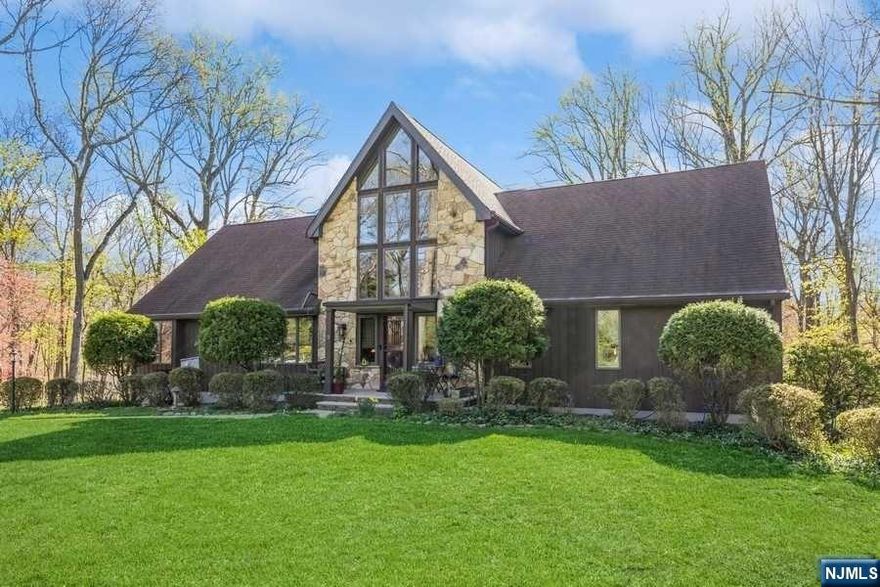 Welcome to your dream home nestled in an exclusive cul-de-sac within a million-dollar neighborhood. This custom-built colonial, spanning over 1.314 acres, presents an unparalleled opportunity for luxurious living. Boasting 6 spacious bedrooms and 4 baths, this home offers ample space for comfortable living and entertaining. Enter through the 2-story foyer, setting the stage for the elegance found throughout. The stunning great room, featuring a fireplace, invites gatherings and relaxation. Entertain in the expansive dining room and intimate adjacent den or enjoy culinary delights in the updated eat-in kitchen, complete with modern amenities and access to the deck overlooking the gorgeous lush yard. The main level includes a primary en-suite and laundry for added convenience. Descend to the finished basement, offering additional living space, a bedroom, office, and rec room. With an oversized 2-car garage, proximity to NYC transport, top schools, Wegmans, and more. Do not miss!