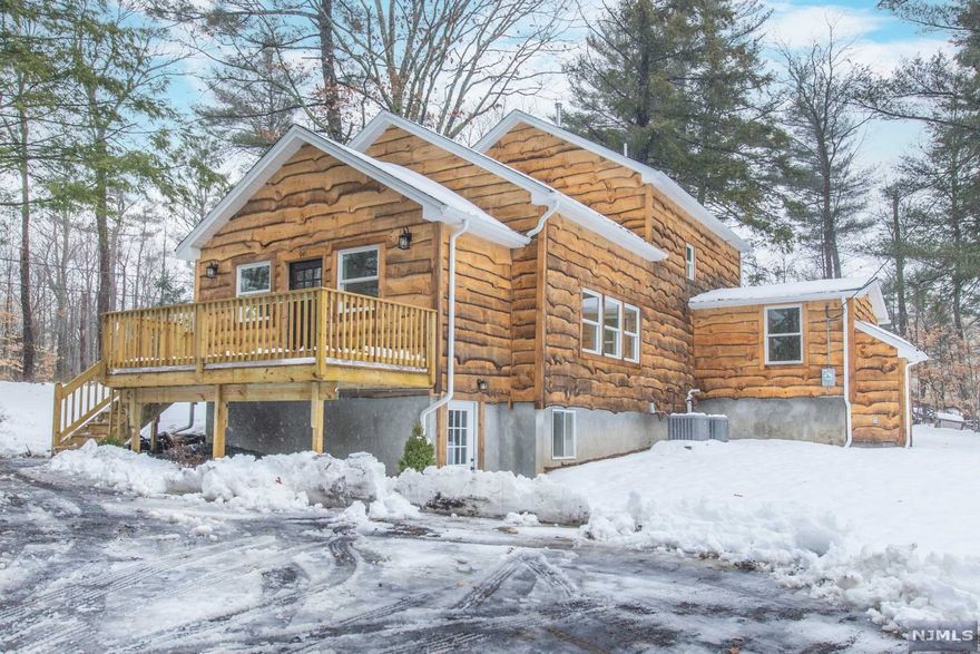 Welcome To This Upper Greenwood Lake Move Right In Custom Home! Completely Renovated, Just Unpack your Bags! Everything is Brand New! This Home Boasts 3 Bedrooms, 2 Full Baths, A Spacious Living Room with Vaulted Ceilings and Eat-In Kitchen with Separate Dining Area! Plus Finished Walkout Basement. Awesome Piece of Property on a Large Corner Lot. Upper Greenwood Lake Community Offers Members Only Beach & Clubhouse, Dock Opportunity, Motor Boating, Kayaking, Swimming, Fishing, Jet Skiing & More Plus Year Round Activities! Just 1 Hour To NYC & Close To Major Highways, Shopping, Dining, Golf Courses, Ski Resorts, Wineries, Apple Orchards, Drive-In Theater & So Much More! Don't Miss This One!