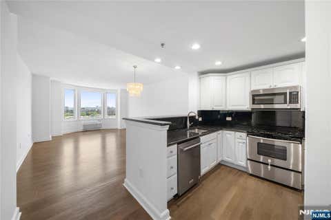 Photo of 6408 City Place, Edgewater, NJ 07020 (MLS # 26011698)