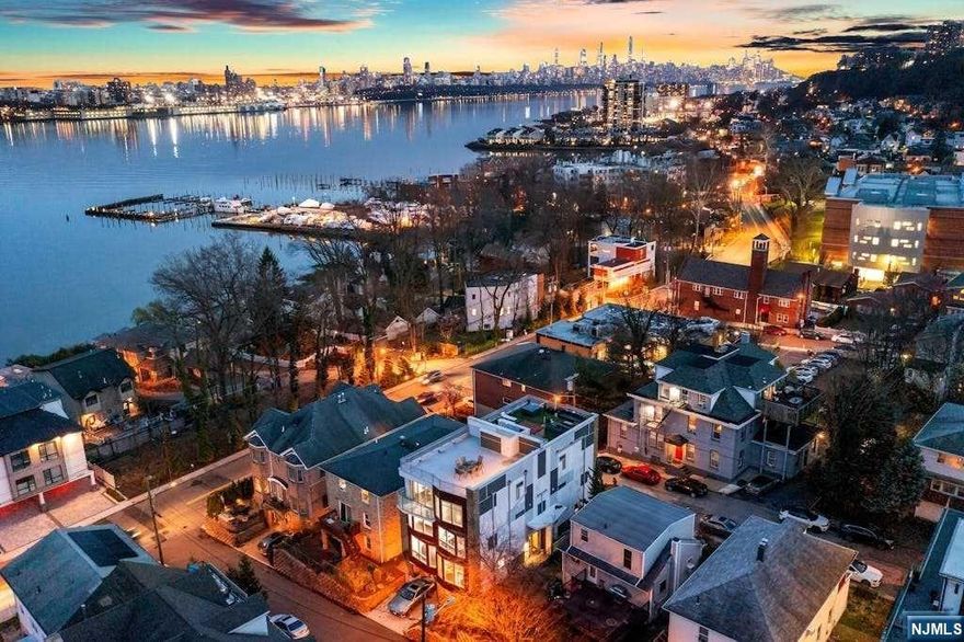 !Waterfront Perch-Grand Terraced Townhouse triplex meets Urban Luxury Living. Boasting sparkling NYC Skyline, GWB & River Views from atop the Spectacular Rooftop Terrace. Contact Angela Cuciniello for more: 201.657-6084. Don't Miss Out