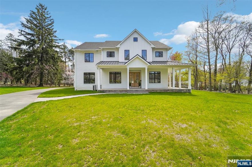 NEW CONSTRUCTION, MODERN FARMHOUSE CUSTOM BUILT HOME WITH THOUGHTFUL ATTENTION TO DETAIL - DESIGNER INSPIRED. TRUE CENTER HALL COLONIAL SITUATED ON NEARLY AN ACRE OF PARKLIKE PROPERTY, BLUE STONE WRAP AROUND FRONT & SIDE PORCH, DOUBLE CUSTOM FRONT DOORS OPEN TO WELCOMING EF FLANKED BY FLR/LIBRARY/OFFICE W/OAK FRENCH DOORS, FDR/ELEGANT INTIMATE DINING, EXPANSIVE GREAT ROOM W/SOARING, DETAIL-BEAMED CEILINGS, GAS FPL, DOUBLE SLIDERS TO PAVER PATIO (YOUR FUTURE POOL), CUSTOM KITCHEN CABINETRY, QUARTZ COUNTERS, MOROCCAN ZELLIGE TILE BACKSPLASH, WHITE OAK BUTCHER BLOCK ISLAND FOR STORAGE & SEATING, CAFE SERIES APPLIANCES, LARGE PANTRY W/CUSTOM CAB & WINE FRIDGE, PR, PRIVATE OFFICE/DEN/MAIN FL BR, MUDRM W/BRICK FLOOR TILE, SHIPLAP WALL DETAIL, ACCESS 2 CAR GAR & PATIO. 2ND FL OFFERS VIEWS OF GRT RM FROM OPEN LANDING. BR, BR, JACK & JILL BATH, BR, FBA, MBR SUITE W/ GAS FPL, CUSTOM CLOSETS, SPA-LIKE MBA, LAUNDRY, STORAGE AREA OFF MBA. FULL FIN LOWER LEVEL - REC RM, BR #5, FBA, GYM/OFFICE.