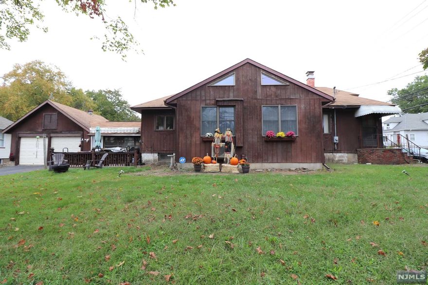 LOCATION! LOCATION LOCATION! EXPANDED RANCH IN THE HEART OF HAWTHORNE. MAIN LEVEL FEATURES A SPACIOUS LIVING ROOM WITH A WOOD BURNING STOVE, A DINING ROOM, TWO GENEROUS SIZE BEDROOMS, FULL BATHROOM AND A KITCHEN. HUGE EXPANDED FAMILY ROOM WITH VALTED HIGH CEILING, SKYLIGHTS AND LOTS OF WINDOWS MAKES THE HOUSE BRIGHT & SUNNY ALL DAY. FULL BATHROOM IS LOCATED FRONT OF BEDROOMS AND SOUTH FACING KITCHEN IS VERY BRIGHT AND ERGONOMIC DESIGN MAKES EASY TO USE. TWO CAR GARAGE WITH ABOVE STORAGE A 4 CAR CAPACITY DRIVEWAY IS AN EXTRA MERIT AND IT LEADS TO A 3 SEASON SUN ROOM WAITING FOR YOUR PERSONAL TOUCH. COZY PATIO HAS A GAS BBQ GRILL AND THE HOUSE SITS ON A 62.5 X 100 LOT AND 200 AMP EQUIPPED FOR BIGGER CAPACITY USES INCLUDING ELECTRICAL VEHICLES. ACTUAL PROPERTY AT 760 LAFAYETTE, 756 IS ON TAX RECORD. CLOSE TO SCHOOLS, RESTAURANTS, SHOPPING, WORSHIP, PARK AND RT.208. A MUST SEE!