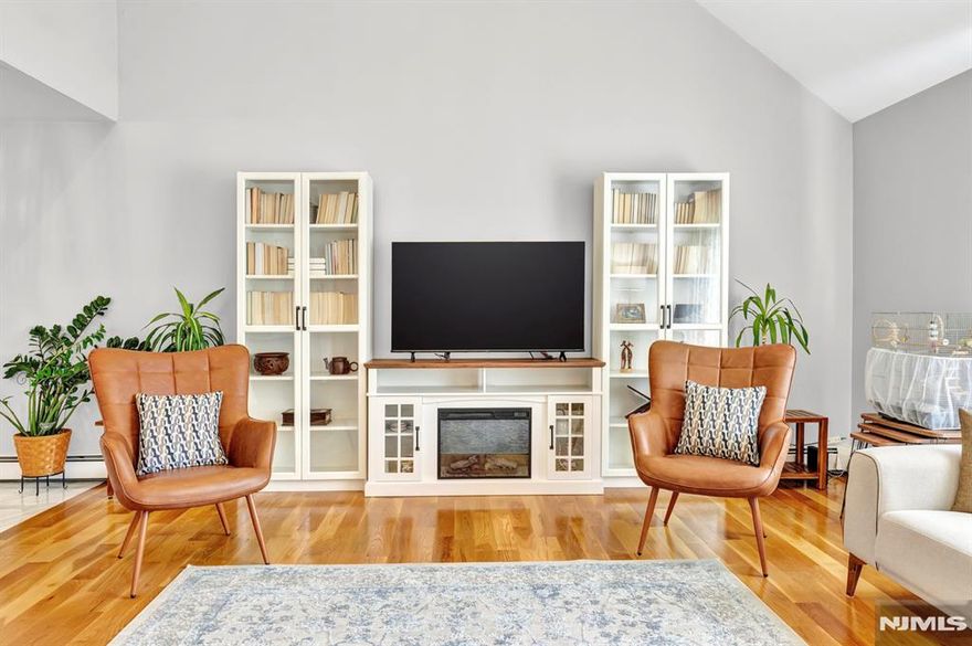 Welcome to this beautifully updated home in Upper Greenwood Lake, now equipped with solar panels for improved energy efficiency! Tucked away at the end of a peaceful cul-de-sac, this spacious property features 4 bedrooms and 3 full bathrooms. Over the years, the home has been thoughtfully upgraded with wood, tile, and marble flooring, fully renovated bathrooms, and modernized kitchen countertops and appliances. The main bathroom was just completed in 2024.The living room boasts vaulted ceilings, creating an open and airy feel, and flows seamlessly into the dining area with sliding doors that lead to a large deck perfect for entertaining. The bright kitchen offers plenty of storage and connects easily to both the dining and living areas.The primary bedroom is a true retreat with tray ceilings and a beautifully finished en-suite bath. Additional bedrooms are generously sized with ample closet space. The lower level includes a fourth bedroom, recreational room with sliders to the backyard, a full bathroom with walk-in shower, laundry area, and utility room. Residents enjoy exclusive access to Upper Greenwood Lake's private beach and clubhouse, with year-round activities like motor boating, kayaking, swimming, fishing, and jet skiing. Conveniently located near shopping, dining, golf courses, ski resorts, wineries, orchards, and more.