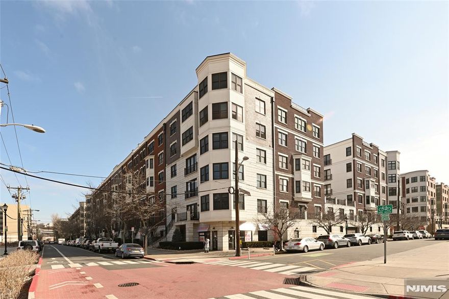 This stylish 2-bedroom, 2-bathroom condo offers 1007 sqft of modern living space, complete with a dedicated parking spot.