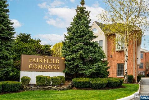 Photo of 271 Us Highway 46 #H112-H113, Fairfield, NJ 07004 (MLS # 26011111)