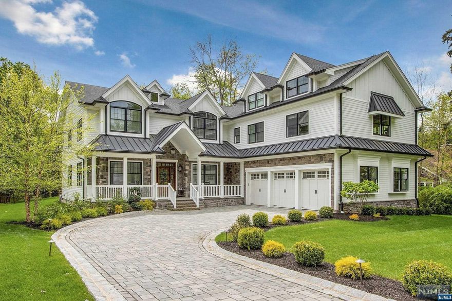 Call Listing Agent Paula Clark 551-500-4487. Breathtaking Newly Built Colonial with lemonade front porch, luxurious open floor plan and beautiful architecture throughout! Grand two-story entrance with soaring ceiling. Banquet-sized dining area, open to expansive great room featuring custom fireplace and French doors to backyard. State-of-the-art gourmet kitchen including custom cabinets, Quartz countertops, large center island, breakfast bar, high-end stainless appliances and wet bar. Spacious junior suite with modern full bath, office and dog spa completed 1st level. 2nd level offers expansive primary suite featuring walk-in-closet and luxurious primary bath with two separate vanities & jetted. Two large bedrooms with modern Jack-n-Jill bath.Generous-sized junior suite with modern full bath.Spacious laundry room & unfinished bonus room completes second level. Lush, professionally landscaped property on over an acre offers covered patio and expansive backyard! 6,200 Sq ft.