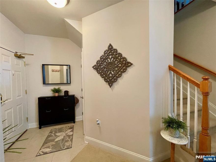 LIVE THE GRANDE LIFE! Beautiful 4th flr Hickory Model with 2 Bdrms, 2 Bths & spacious loft! 1,550 SF of elegance. Cathedral ceiling! Private, quiet end unit. Featuring 2 Bdrms w/custom WIC in each bdrm. 2 updated FB! Kitchen w/ ctr island, SS appliances, upgraded cabinets. Spacious LR w/gas FP. Separate dining area with plenty of windows & light. Spacious Loft which can be used as another bdrm, office or whatever your heart desires. Ldry rm W/ full size W/D! Amazing low Riverdale taxes. One car garage assigned parking space underneath bldg. Plus add'l parking. Great amenities include 2 clubhouses, 2 pools, tennis courts, fitness ctr, billiards room, conference rooms, party rooms & much more. PET POLICY- MAX 2 PETS PER CONDO -35LB WEIGHT LIMIT PER PET.