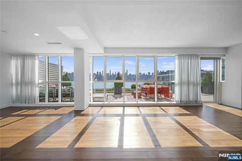 Photo of 800 Ave At Port Imperial #619, Weehawken, NJ 07086 (MLS # 26016325)