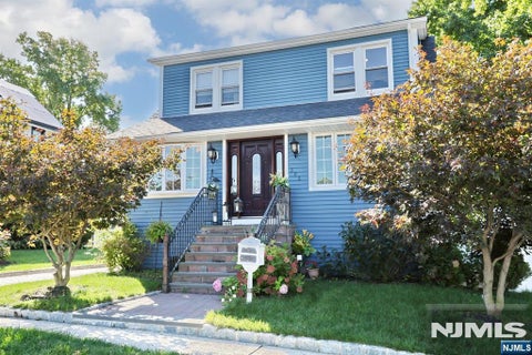 Photo of 302 W Clinton Ave, Bergenfield, NJ 07621 (MLS # 26041127)