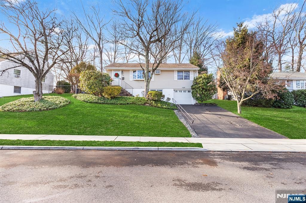 Photo of 69 Hilltop Terrace, Bloomingdale, NJ 07403 (MLS # 25042857)