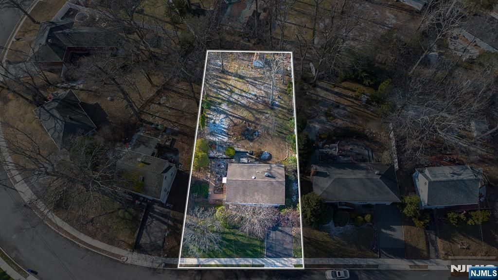 Photo of 69 Hilltop Terrace, Bloomingdale, NJ 07403 (MLS # 25042857)