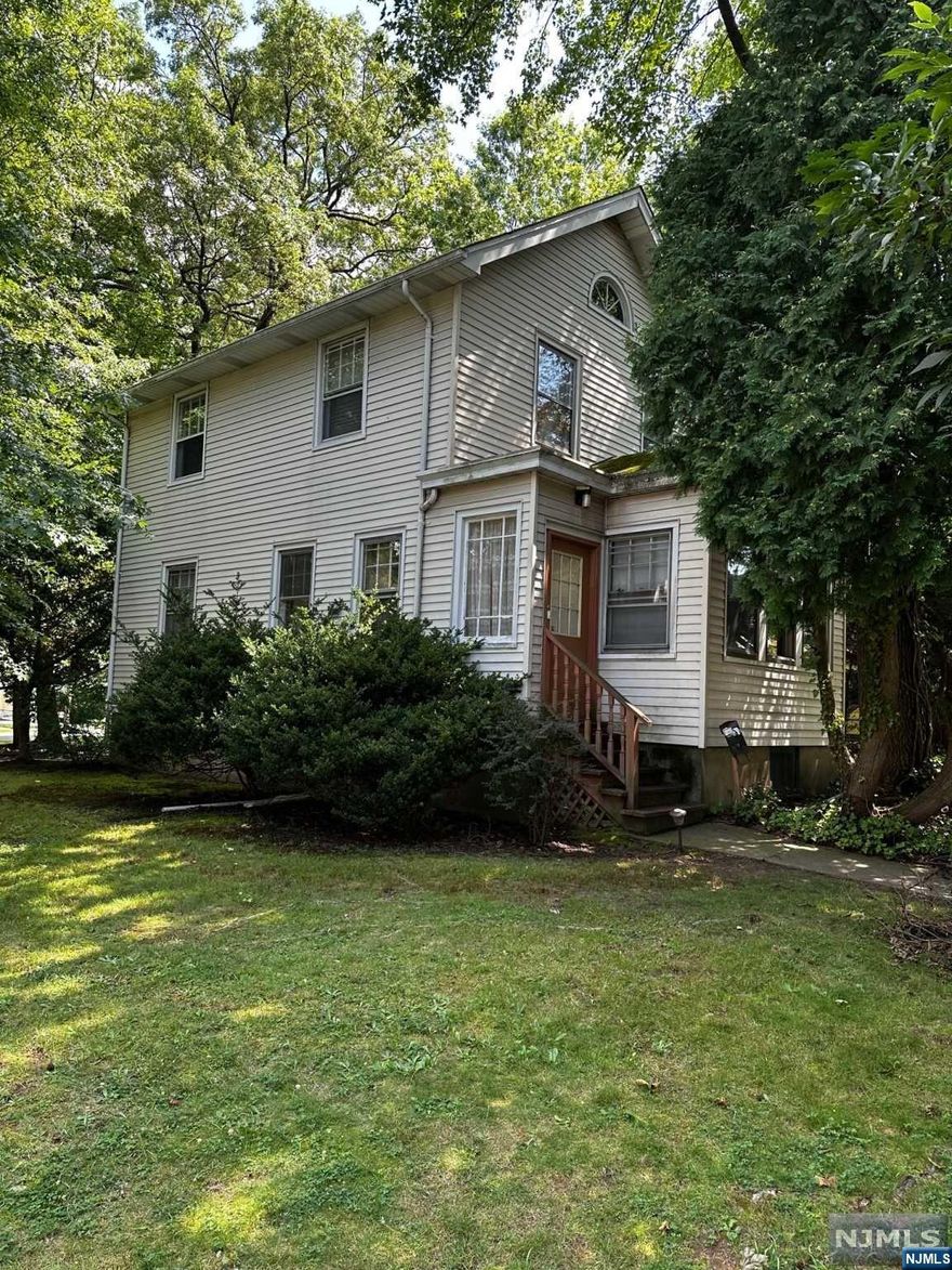 Opportunity is knocking! Come view this colonial home just steps from Seton Hall University. This property needs TLC with lots of potential being sold strictly "as is". The 1st floor features a eat in kitchen, living room, bedroom and 1 full bath. The 2nd floor has 2 bedrooms and 1 full bath. The basement is unfinished with plenty of storage space. Also has a detached garage and parking for 4 additional cars. Located short distance from NYC train station and the downtown village with plenty of restaurants and shops.