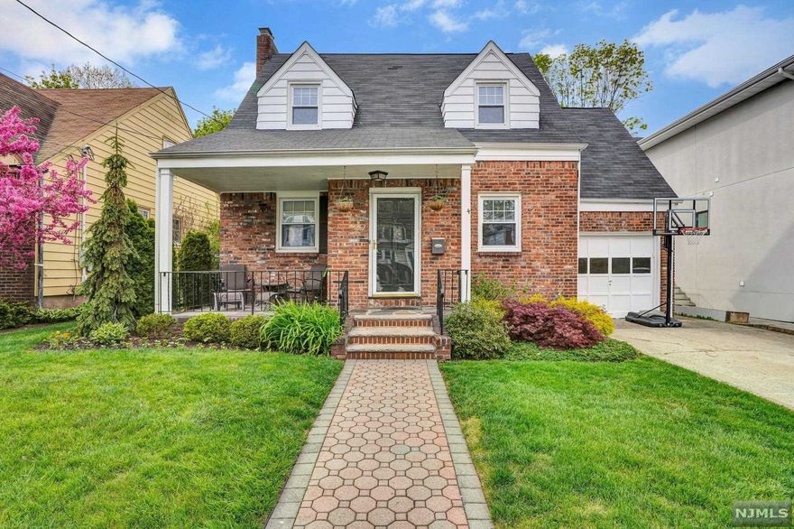 Great location near parks, houses of worship, buses, shopping, restaurants! 4 bed/2.5 bath center hall colonial. 1st floor has large living room w/ fireplace, formal dining room, family room, newly renovated powder room, kitchen with two sinks, and dining area. Second floor has four bedrooms and hall bath (one bedroom is accessed through another). Finished basement with full bath, laundry, storage, rec area and "room." French drains and sump pumps installed by owners when purchased. Hardwood on first floor. One car attached garage (no access to house). Lovely backyard.