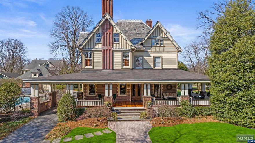 INTRODUCING A TIMELESS QUEEN ANNE STYLE HOME DESIGNED BY ARCHITECT HENRY HUDSON HOLLY ON .808-ACRES W/ POOL & 4 SEASON SPA. THIS MAGNIFICENT HOME W/ EXPANSIVE COVERED WRAP-AROUND PORCH BOASTS 11.5' CEILINGS & BEAUTIFUL MILLWORK THRUOUT. THE ENTRANCE HALL W/ GRAND STAIRCASE LEADS TO DEN/OFFICE W/ FRENCH DRS TO THE FRONT PORCH. A SPACIOUS FRONT TO BACK LR W/ FPLC SEAMLESSLY CONNECTS TO THE FORMAL DR & BUTLER'S PANTRY. THE HEART OF THE HOME IS THE GOURMET KITCHEN BLENDING CLASSIC ELEGANCE & MODERN UTILITY. ADJACENT A DEN/EATING AREA, MUDRM W/ PATIO ACCESS & CONVENIENT LAUNDRY RM. THE 2ND FLR HOSTS 3 BRS, FULL HALL BTH & PRIMARY BR W/ ENSUITE BTH, WHILE THE 3RD FLR OFFERS A 5TH BR, OFFICE, & LRG.FAMILY RM W/ WET BAR. CONVENIENT AMENITIES INCLUDE 1ST FLR FULL BTH, COVERED PORTICO, CIRCULAR DRIVEWAY, 2-CAR GARAGE W/ STORAGE, .5 BTH & DRESSING AREA. THIS METICULOUSLY MAINTAINED HOME OFFERS A UNIQUE CHANCE TO OWN A PIECE OF HISTORY LOCATED NEAR RIDGEWOOD'S SHOPS, RESTAURANTS & NYC TRANS.