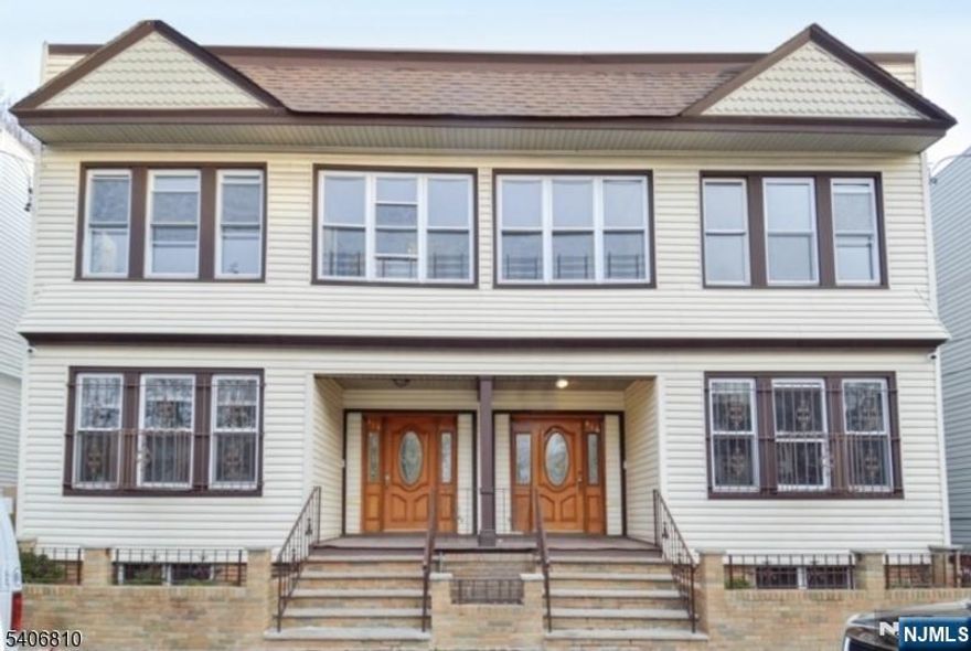 Incredible opportunity knocking! This well-maintained 4-unit multifamily property in the Upper Clinton Hill section of Newark, NJ features four spacious units, each offering 3 bedrooms and 1 bathroom with separate utilities and high ceilings, making it ideal for investors or owner-occupants. The full basement presents strong value-add potential, with the opportunity to be finished into two additional units if approved by the township or a laundry area and tenant storage for convenience. A shared driveway along the right side of the home provides access to a rear parking area with at least six comfortable parking spaces. Conveniently located near the Garden State Parkway, Route 280, and other major highways, this property also offers excellent access to NJ Transit, providing easy travel to Newark Penn Station, Newark Liberty International Airport, NJPAC, The Newark Museum of Art and a variety of popular restaurants and attractions. Please DO NOT park in the driveway. There is plenty of on-street parking for showings.