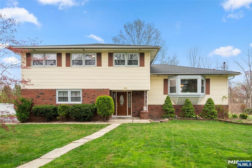 This spacious and well-maintained home offers 4 bedrooms and 2.5 bathrooms, nestled in a tranquil residential neighborhood. Upgraded in 2019 with new garage doors, all interior doors, a fully renovated kitchen with granite countertops, modernized bathrooms, updated flooring throughout, and a new roof. The finished basement provides versatile space ideal for a home office, gym, or entertainment area. Step outside to a large deckâ€”perfect for barbecues and outdoor gatherings. Conveniently located near shopping centers and parks, with easy access to major highways including I-80, I-280, I-287, U.S. Routes 46 and 202, and NJ Routes 10 and 53, commuting is a breeze. The building itself is not located in a flood zone. Only a portion of the land falls within a 0.2% annual chance flood hazard area. Donâ€™t miss the opportunity to make this beautiful home yours!