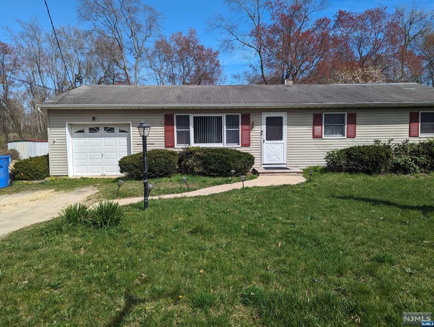 Charming 4-bedroom home boasting 2 baths, nestled on over an acre of land! This residence showcases an inviting open living room, a spacious dining area, and a large kitchen perfect for gatherings. Enjoy the comfort of a Primary Bedroom with an ensuite bath and a walk-in closet, along with three additional bedrooms and a main bath. The ample outdoor space is ideal for entertaining guests. Don't let this opportunity slip away; schedule your showing today!