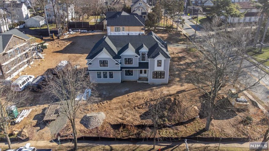 BRAND NEW CONSTRUCTION CUSTOM masterpiece on a HUGE lot that will feature a 5,000 square foot house. Upon completion, this home will feature 5 bedrooms and 6.5 bathrooms (each bedroom hosts its own en-suite). The kitchen features designer cabinetry and professional grade appliances. Great layout with Living Room, Dining Room, Breakfast Area, guest quarters with en-suite bathroom, and HUGE two story great room on the first floor. Upstairs, the Primary Suite has a spa-like en-suite bathroom plus 2 Double Walk In Custom Closets. Laundry on 2nd floor for your convenience. Finished Basement will feature a full bathroom. Do not miss this stunning home!!!