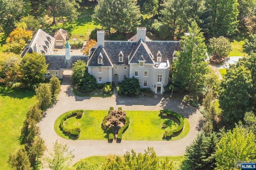 Experience the epitome of palatial luxury at this French Chateau Inspired Mansion. Classic and Timeless Architecture define this residence. Private, 3 park-like acres on magnificent grounds. This impressive gated entryway, elaborate driveway and landscaping leading to a 3-Story, 20 Room home. Upon entering the 2 story entry, you note the bright and light filled space. Boasting 11 Bedrooms, 7 full bathrooms, Formal Living room, Banquet Size Dining Room, Library, and 2 sunrooms to start. The lofty ceilings continue including the 3rd floor. This home is for the discerning buyer who is looking for a private, tranquil, property where all your dreams can come true. A few short miles to Manhattan and a Prime Location in Beautiful Englewood. Walking Distance to House of Worship and Beautiful Downtown. Separate Carriage House with 3 bedrooms, living room and kitchen.