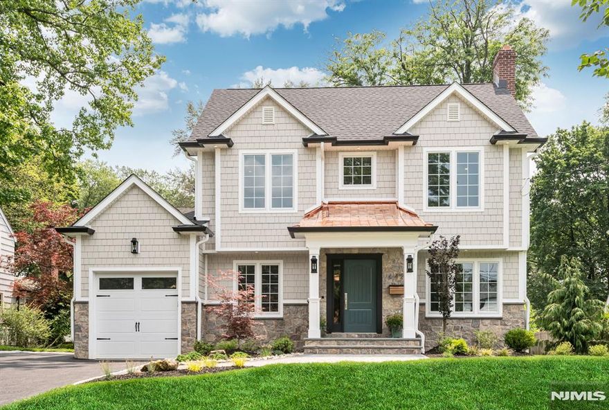 Welcome to this fully renovated and expanded 4-bedroom, 3.5-bathroom home located in one of the most desirable neighborhoods in Ho-Ho-Kus. This home showcases highly reputable, Top-of-the-Line construction and features custom millwork throughout, along with many elevated details. The first floor is flooded with natural light and includes a formal living room, a dining room with an elegant fireplace, a great room featuring a fireplace with a marble surround, and sliders that open to the bluestone patio. The eat-in kitchen is a chefâ€™s dream with custom cabinetry, cabinet lighting, an oversized island, and high-end appliances, including a Wolf Sub-Zero refrigerator, Wolf stove, and JennAir wine cooler. Additional conveniences on this floor include a mudroom and a powder bath. Upstairs, you will find a private primary bedroom with a vaulted ceiling and wood beams, complemented by a luxurious ensuite bathroom featuring a shower, soaking tub, and a walk-in closet. An additional bedroom with an ensuite bathroom, two more bedrooms with a hall bathroom, and a convenient laundry room complete the second floor. The finished basement offers a recreational area and ample storage space. Outside, enjoy the spacious, flat backyard perfect for relaxation or entertainment. This home is a perfect blend of comfort and luxury, ideal for those seeking an elevated living experience in Ho-Ho-Kus.