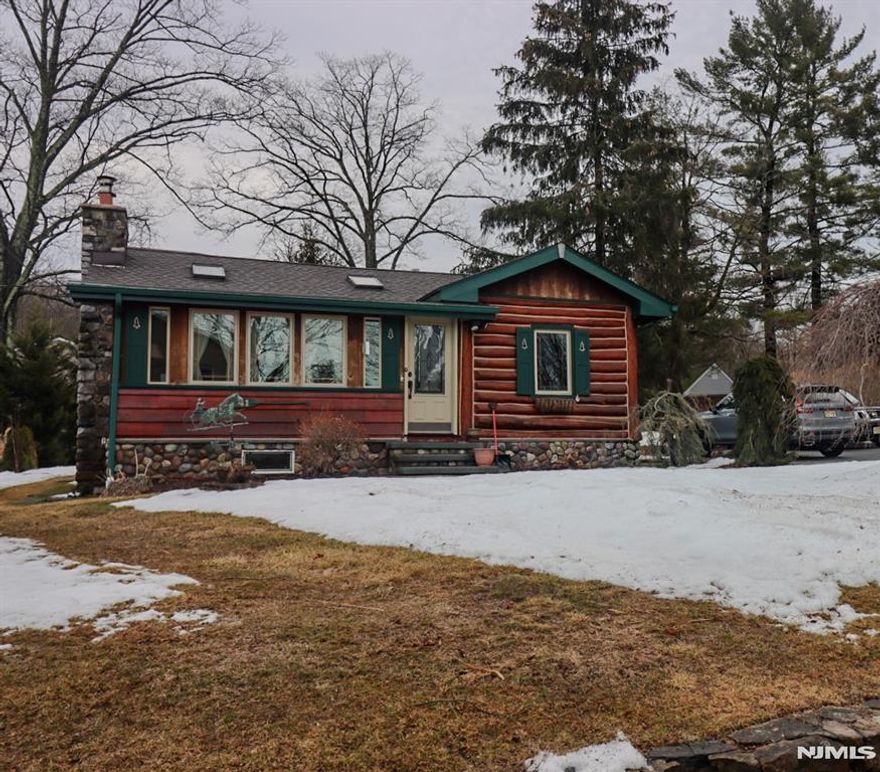 Beautifully maintained log home owned by a tree professional who truly appreciated quality craftsmanship and natural wood. This move-in-ready property has been extensively updated with a newer roof, renovated kitchen with all new cabinets and granite countertops, new windows and skylights, covered deck, tongue-and-groove pine ceilings, woodstove insert, and a brand-new septic system currently being installed. Located just minutes off Route 23 in a desirable lake community offering beach and playground access. A perfect blend of rustic charm and modern updates nothing to do but move in and enjoy!