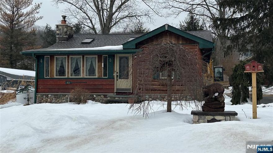 Beautifully maintained log home owned by a tree professional who truly appreciated quality craftsmanship and natural wood. This move-in-ready property has been extensively updated with a newer roof, renovated kitchen with all new cabinets and granite countertops, new windows and skylights, covered deck, tongue-and-groove pine ceilings, woodstove insert, and a brand-new septic system currently being installed. Located just minutes off Route 23 in a desirable lake community offering beach and playground access. A perfect blend of rustic charm and modern updates nothing to do but move in and enjoy!