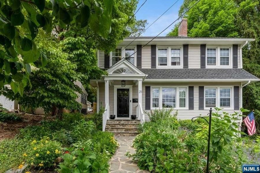 Located in a highly sought-after neighborhood w/ easy access to NYC & local schools, this home is the perfect combination of modern & timeless charm. Enjoy the spacious living area w/ its cozy wood-burning fireplace & abundance of natural light. The semi-open floor plan is perfect for hosting guests, w/ elegant elliptical arches connecting the living & dining areas, and an additional sunroom & family room offer endless opportunities for relaxation. The kitchen has top-of-the-line appliances & a wine refrigerator. Upstairs, 3 large bedrooms provide comfort & privacy. Primary bedroom features a walk-in closet. The beautifully landscaped yard offers ample space for outdoor activities & relaxation, while the attached garage and partially finished basement add convenience & functionality. With exquisite craftsmanship & architectural details throughout, this elegant 4-bedroom property is a must-see!