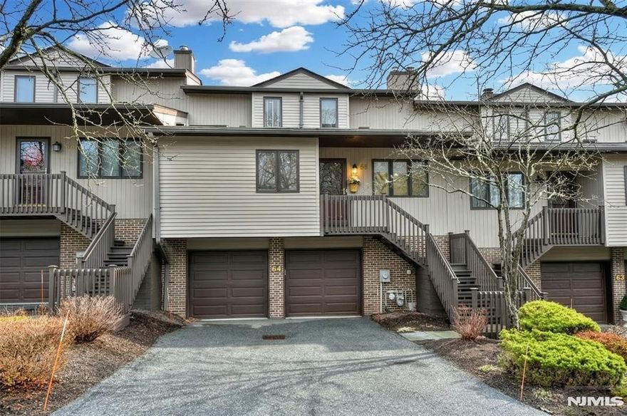 Welcomed to this beautifully move-in ready well maintained three-bedroom, two full , and one half townhome. Nestled in the desirable Peach Hill community. This comfortable flowing floor plan offers an abundance of light and comfort. The eat-in kitchen has a center island with granite countertops, SS appliances, plenty of cabinetry for storage , the attached sitting area with a wood burning fireplace is perfect for relaxing. The spacious living room offers plenty of space for living and entertaining, with sliding doors lead to the outside deck. First floor primary bedroom is a spacious and bright retreat, fabulous renovated primary full bathroom, built in vanity area, and a large WIC to complete the space The laundry room and half bath are located on the main level as well. Upstairs are two well appointed bedrooms, and a full updated bathroom. The basement is fully finished with multiple storage closets, and generous living space for the family. Plenty of room for gym/office space. Entry from the two car garage is a plus. Please call Terri Savelli for more information 201 669-0757