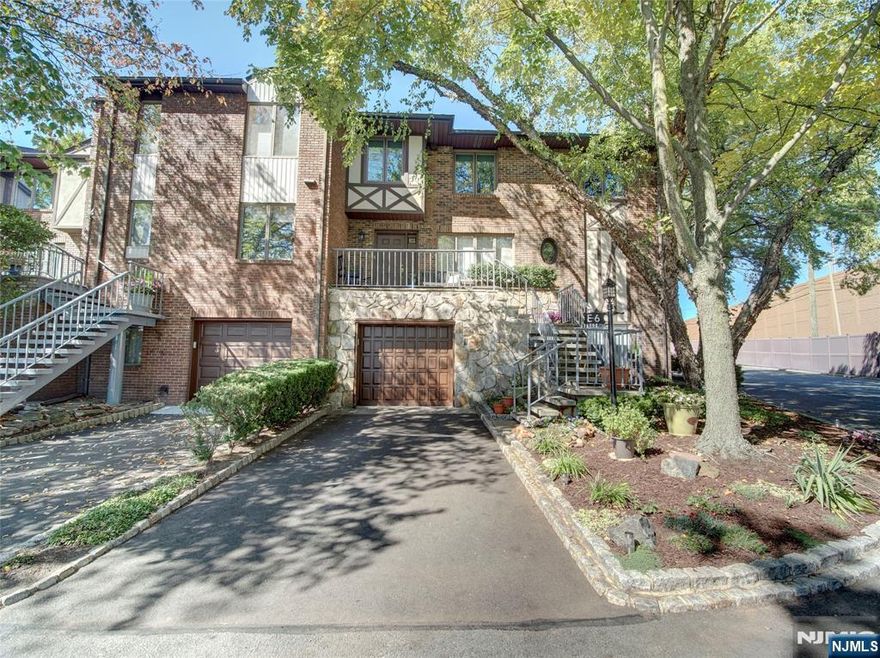 Beautiful End-Unit "Claremont model Townhome " A Commuter's Dream! Located in the desirable Montclair Heights section of Clifton at Hamilton Crest, this spacious tri-level home offers 2 bedrooms, 3.5 baths, and multiple living areas perfect for today's lifestyle. The main level features newer flooring with elegant crown molding, a formal dining room, and a bright living room that opens to a private patio ideal for entertaining or relaxing. The updated kitchen is equipped with granite countertops, stainless steel appliances, side-by-side refrigerator with water/ice dispenser, pantry, and garbage compactor. A cozy family room with a wood-burning fireplace and a convenient powder room complete this level. Upstairs, the primary suite includes a full bath, while the second bedroom has its own private bath. Additional storage is available in the attic. The finished lower level provides endless possibilities featuring a full bath, laundry, abundant closets, and flexible space that could easily function as a guest suite, home office, or recreation room. Additional highlights include an attached garage, driveway space, guest parking, and unbeatable commuter convenience with the NYC bus stop right across the street. Enjoy easy access to downtown Montclair, NJ Transit trains and buses, major highways, and MSU.