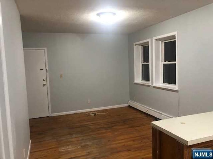 FIRST FLOOR UNIT, 2 BEDROOMS, LIVING ROOM, EAT IN KITCHEN AND BATHROOM. NO CARPET. HARDWOOD FLOOR. , NO LAUNDRY OR PARKING AVAILABLE. NO REFRIGERATOR PROVIDED. ONE MONTH AND HALF SECURITY REQUIRED. AVAILABLE FOR JUNE 1. FULL APPLICATION, PROOF OF IDENTITY, INTERVIEW, PROOF OF ABILITY TO PAY RENT. NO PETS OF ANY KIND ALLOWED - PHOTOS ARE FROM PIOR THE TENANTS MOVED IN.