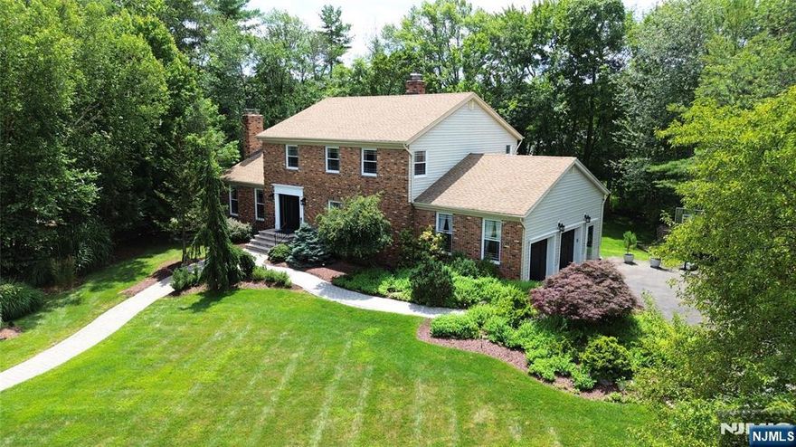 Nestled on a peaceful double cul-de-sac with direct access to the serene Celery Farm Nature Preserve, this brick-faced colonial perfectly blends modern living with the beauty of nature. Situated on over half an acre of park-like property, the home offers a flexible layout with a sunken living room with steps up to the formal dining room and eat-in kitchen. A spacious great room at the rear opens to a large deck overlooking the lush yard with pond views from every angle. The first floor boasts a convenient bedroom or home office, adjacent to a full bath, laundry room, mudroom and attached 2 car garage. Upstairs, youâ€™ll find 3 bedrooms including a generous primary suite with a walk-in closet and light-filled bath featuring a skylight, jetted tub & glass enclosed shower. The finished lower level provides endless possibilities for recreation, work or play. A special opportunity for those who love a peaceful surrounding without sacrificing everyday comforts.