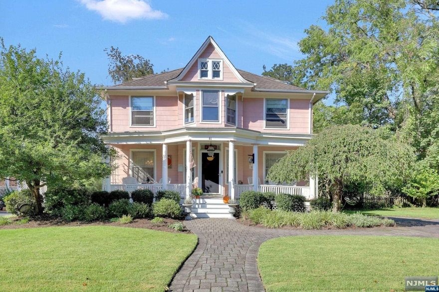 WOW! GORGEOUSLY PRESERVED & CONSCIENTIOUSLY UPDATED. OLD WORLD CHARM & GRACIOUSNESS ABOUND IN THIS REGAL COLONIAL. THE IMMACULATE RESIDENCE RETAINS THE CHARMS OF YESTERYEAR WHILE OFFERING A HOST OF MODERN CONVENIENCES. SITS ON A FANTASTIC LARGE PRIVATE FLAT LOT. The deep front porch welcomes you into gracious Entry Hall & formal Living Rm w/fireplace (decorative*). Period chandeliers & stylish wallpaper accent many spaces throughout the home. Dining RM is spacious W/ Butler's Pantry & built-in China closet that Opens to Sunny Updated eat-in Kitchen. Upstairs are 3+ bedrooms & full bath with lg vanity. Stunning Primary BR has 2 walk-in closets plus a sitting room overlooking the front yard. Basement adds Family Rm/Game Rm, a fantastic Craft Room, Laundry w/Kitchenette & a magnificent Wine Room... something for everyone! Nothing to do but move in to this stunning historic home! Fantastic quiet neighborhood, Highly rated schools, walkable to downtown & train. HURRY. WILL NOT LAST!