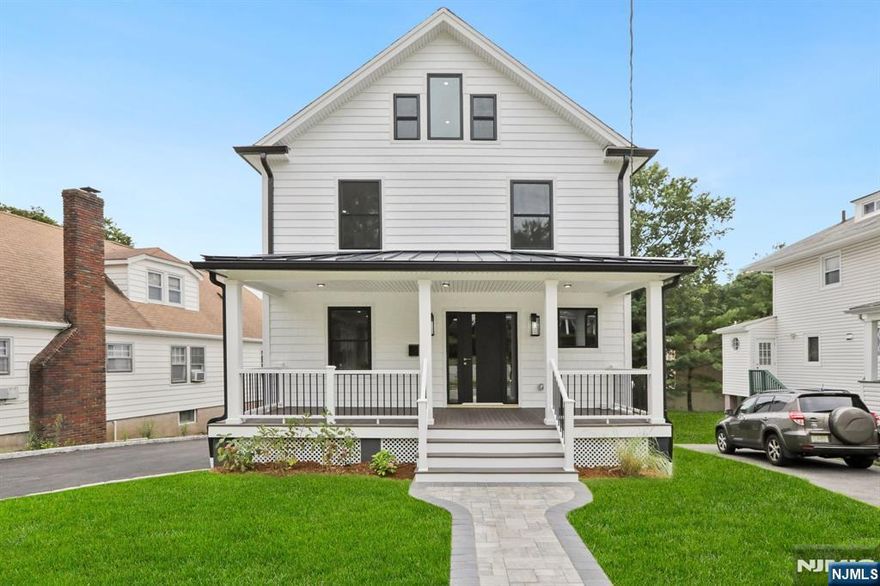 Newly renovated Colonial in desirable Caldwell, NJ, featuring 4 bedrooms, 4.5 bathrooms, and a bright open-concept layout. Set on a level lot with a charming front porch, this home blends classic curb appeal with modern updates throughout.The main level offers an inviting floor plan with updated flooring, recessed lighting, and a sleek, modern kitchen that opens seamlessly to the dining and living areas perfect for both everyday living and entertaining. Upstairs includes four bedrooms, including a primary suite with a private ensuite bath and a walk-in closet. A finished attic provides flexible bonus space, ideal for a home office, media room, or guest suite. Exterior highlights include a double garage, an extended driveway with ample parking, and a freshly updated front porch that enhances the home's charm. The finished walkout basement with a full bath adds even more living space.Just minutes from downtown Caldwell's restaurants, caf s, and boutique shops. Outdoor enthusiasts will enjoy nearby Grover Cleveland Park with trails, playgrounds, and wide-open space. Easy access to NYC transit, and close proximity to major highways.