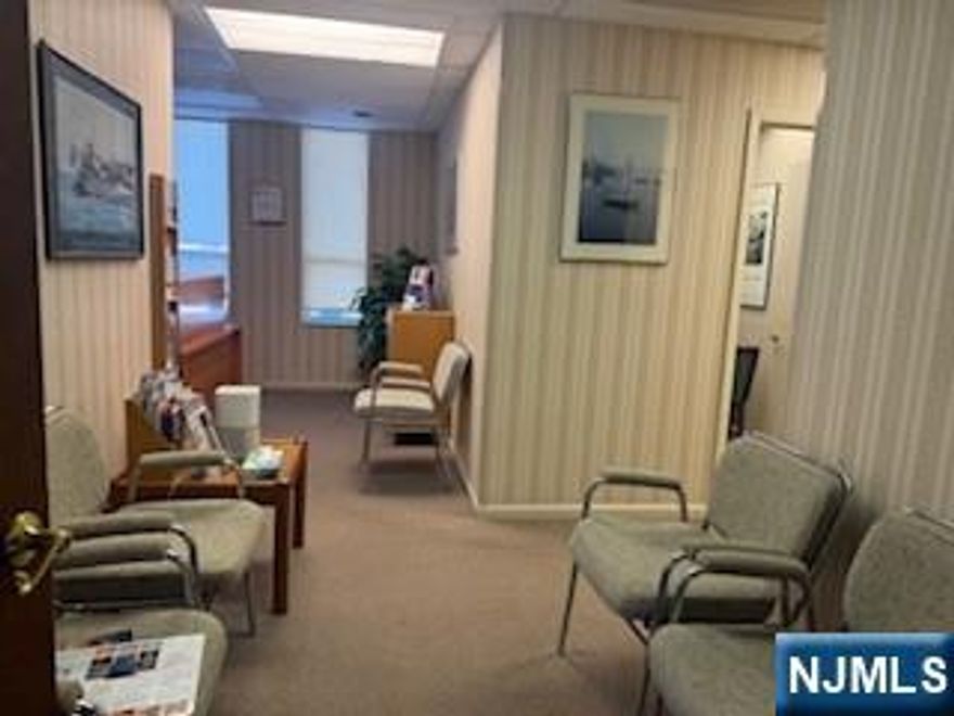 Attractive 2 story building with front and back entrances and bright atrium lobby. High visibility professional office condo which offers 620 square feet. Convenient first floor handicap accessible unit with easy access to route 23,287 and 202. Condo includes waiting area, reception area, private office and 2 exam rooms, private bathroom and storage area in basement. Complex has parking for 32 cars and 2 designated spaces for handicap. Quarterly HOA dues of $1170 plus reserve dues of $64/ quarter.