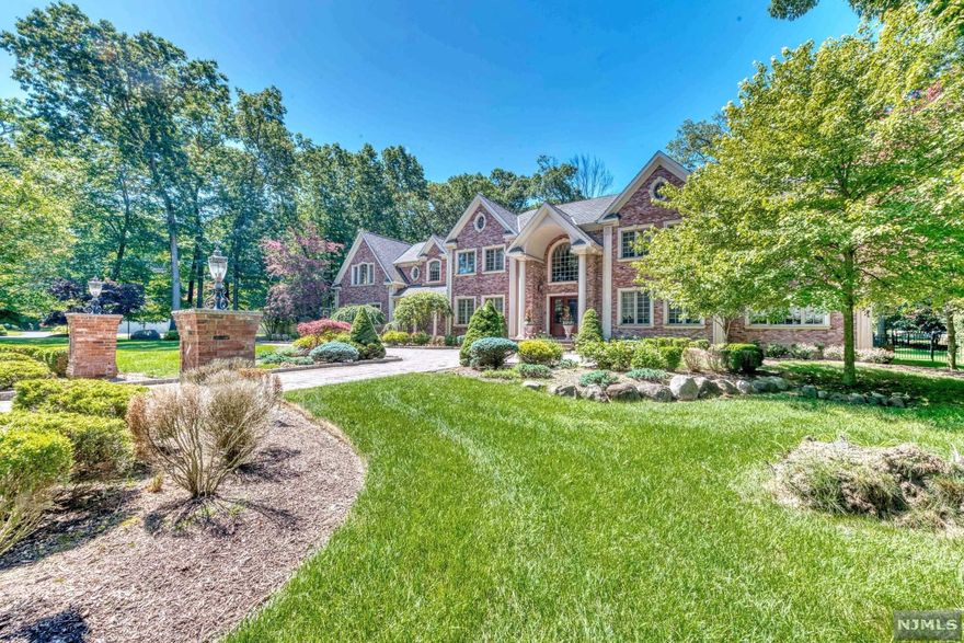 Classic all brick Center Hall Colonial of 7200+ sq ft set on beautifully manicured acre in prestigious South Gate of Urban Farms. This exceptional home was custom built in 2008 & offers a combination of architectural sophistication & classic elegance. Six large bedrooms, 7.5 baths, dramatic 2-story foyer w/ sweeping staircase, hand painted walls, cherry wood floors, 10' ceilings, four fireplaces & beautiful custom millwork throughout. The 1st floor features LR, DR, GRT Rm, Kitchen, Library, BR/bath, a guest BR/bath, bath, PR & lndry. The 2nd floor offers a sumptuous master suite w/fpl/sitting rm & luxurious bath, Three/four additional bedrooms, three baths including a BR/recreation room w/bath. The private back yard is perfect for entertaining w/an outside kitchen, patio & sparkling in-ground pool. Steps away from the Indian Trail Club, the Market Basket shopping center & the High Mountain Reserve offering boating, fishing & miles of hiking trails.